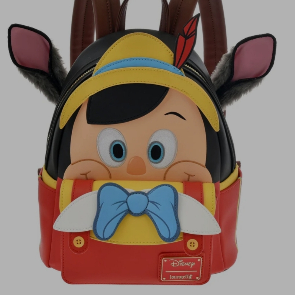 DISNEY PARK 2013- Loungefly Pinocchio Disney 100 Decades